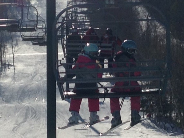 Students going up a ski lift